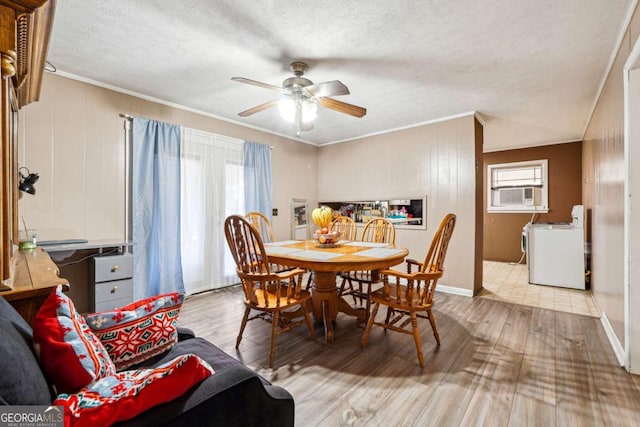 dining room with ceiling fan, light hardwood / wood-style flooring, plenty of natural light, and ornamental molding