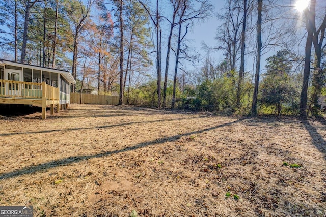 view of yard with a deck