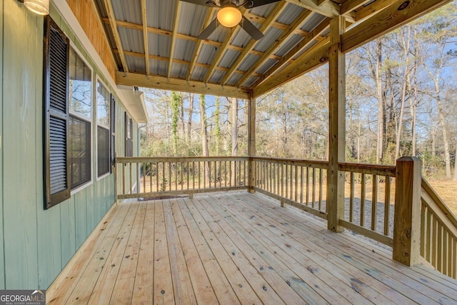 wooden terrace featuring ceiling fan