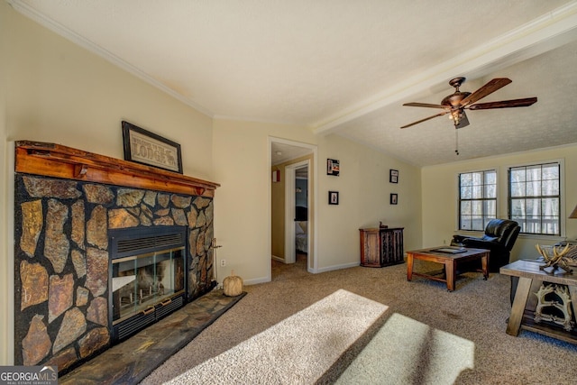 living room with carpet flooring, lofted ceiling with beams, a stone fireplace, and ceiling fan