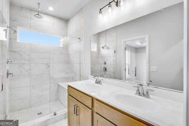 bathroom with vanity and walk in shower