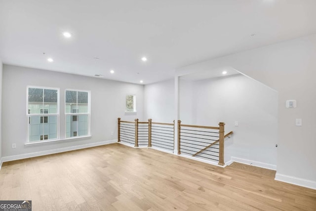 unfurnished room featuring light wood-type flooring