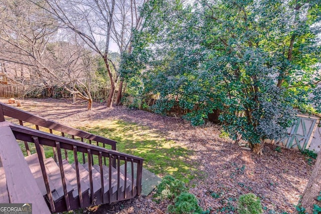 view of yard with a deck