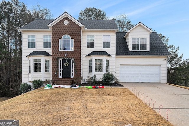 view of front of property featuring a garage