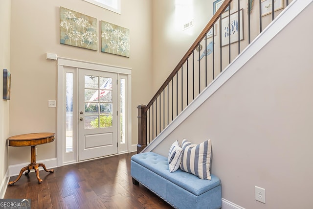 entrance foyer featuring dark wood-type flooring