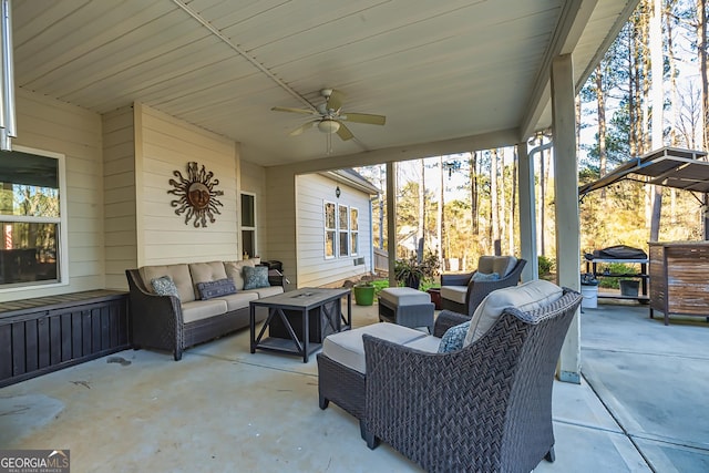 view of patio / terrace with ceiling fan, area for grilling, and an outdoor hangout area