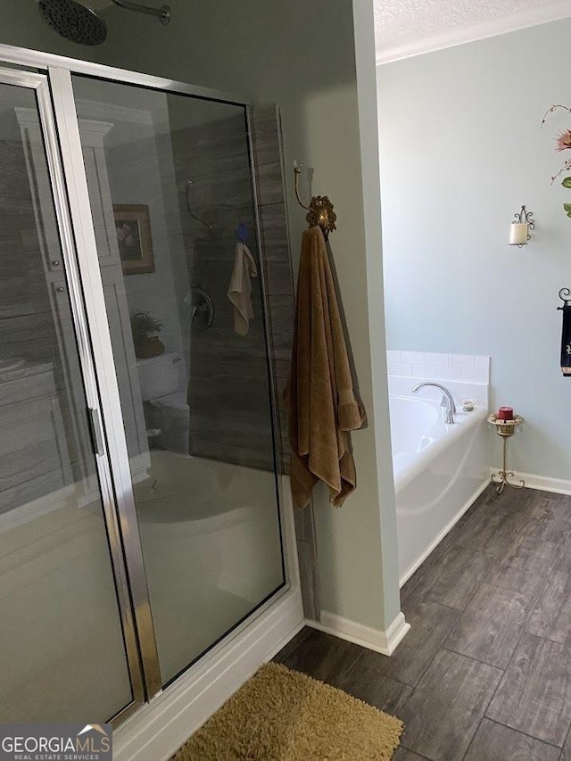 bathroom featuring plus walk in shower