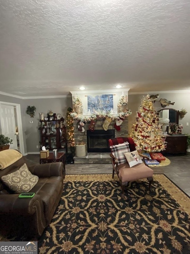 living room with a textured ceiling and ornamental molding