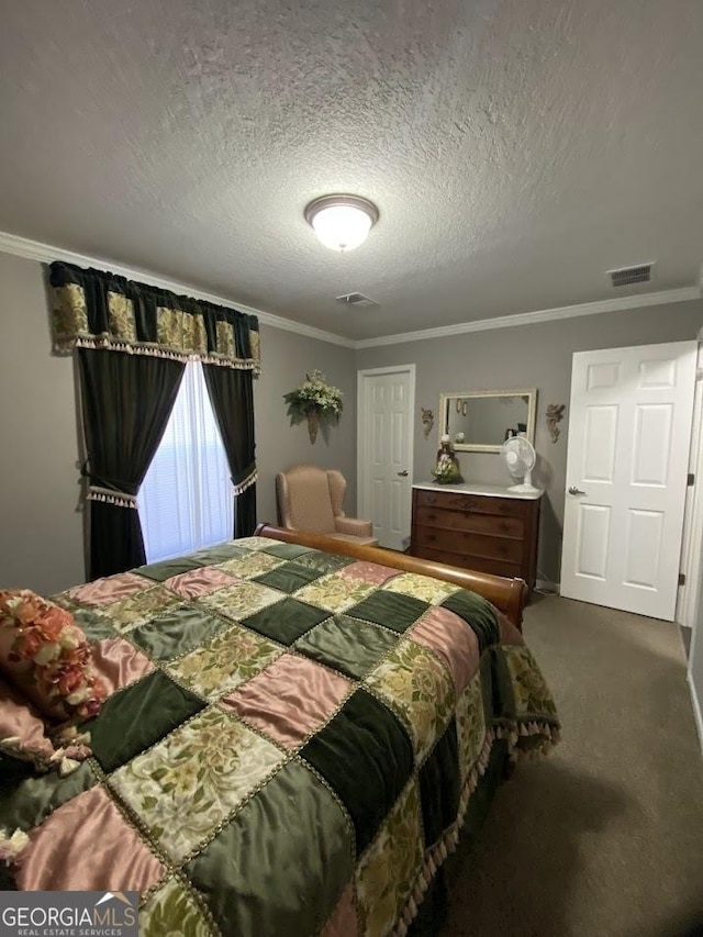 carpeted bedroom with a textured ceiling and ornamental molding