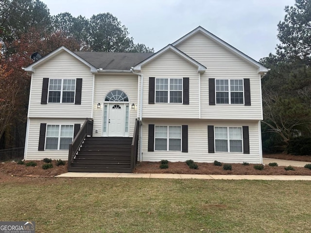 split foyer home with a front yard
