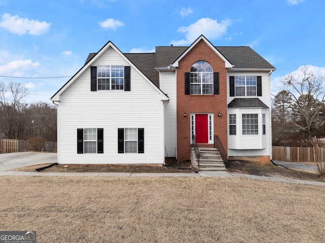 view of front of house with a front lawn