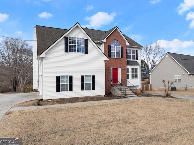 view of front property with a front lawn