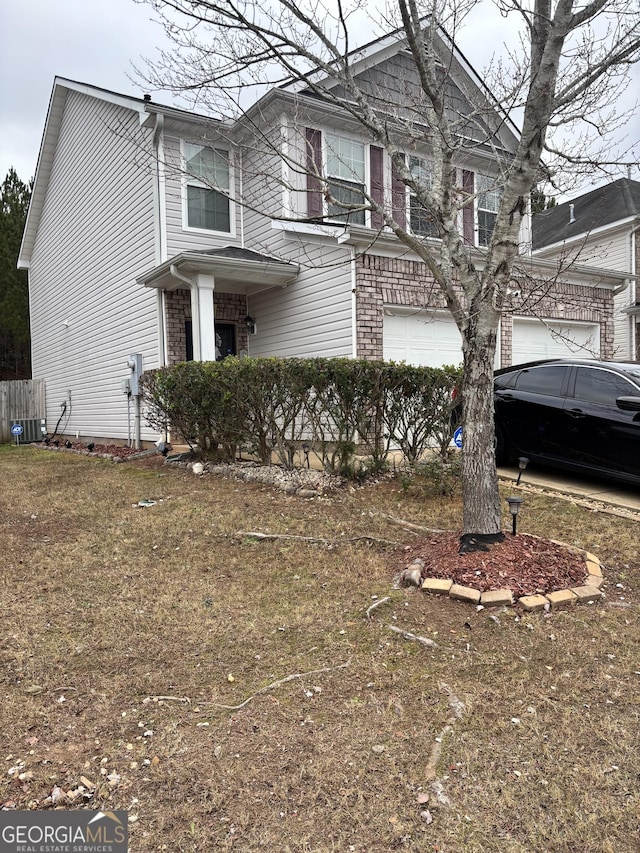 view of side of home with a garage