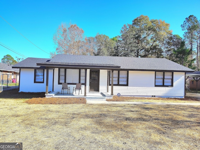 ranch-style house featuring a front yard