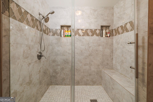 bathroom with walk in shower