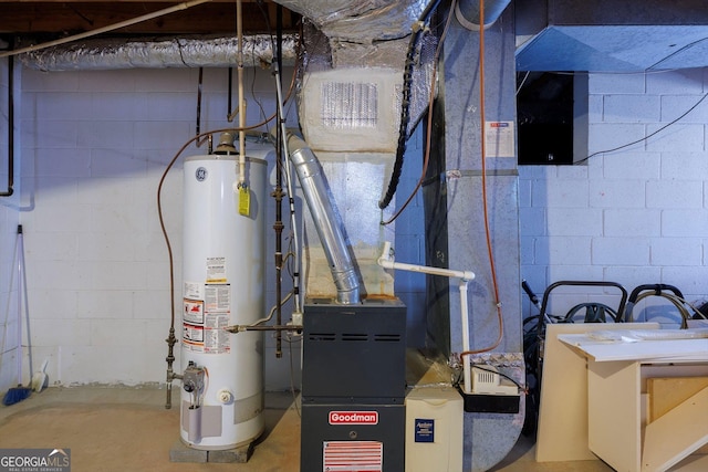 utility room featuring gas water heater