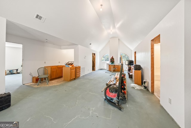 additional living space with vaulted ceiling