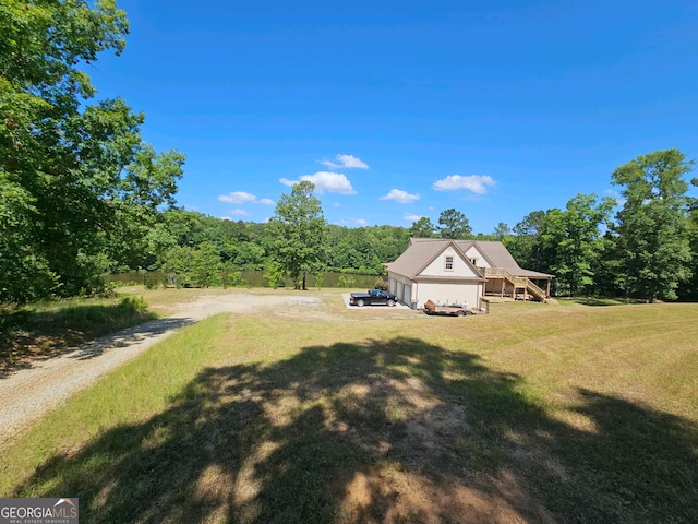 view of yard with a garage