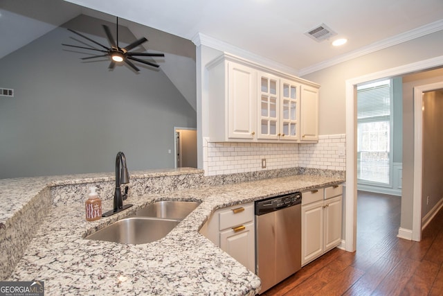 kitchen featuring white cabinetry, dishwasher, sink, and light stone countertops