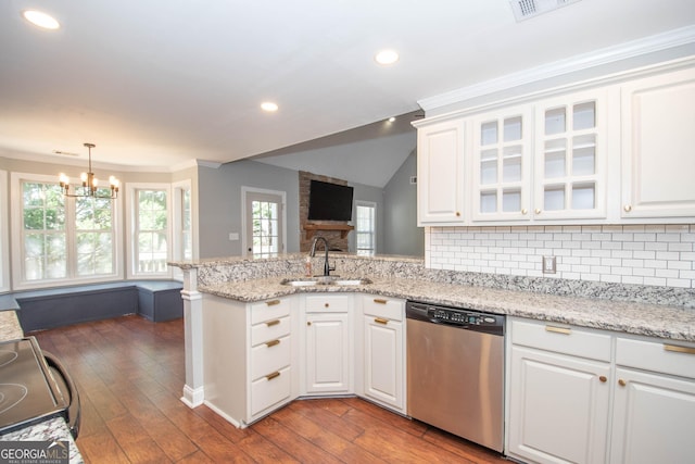 kitchen with white cabinetry, stainless steel dishwasher, and sink