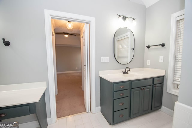 bathroom with tile patterned flooring and vanity