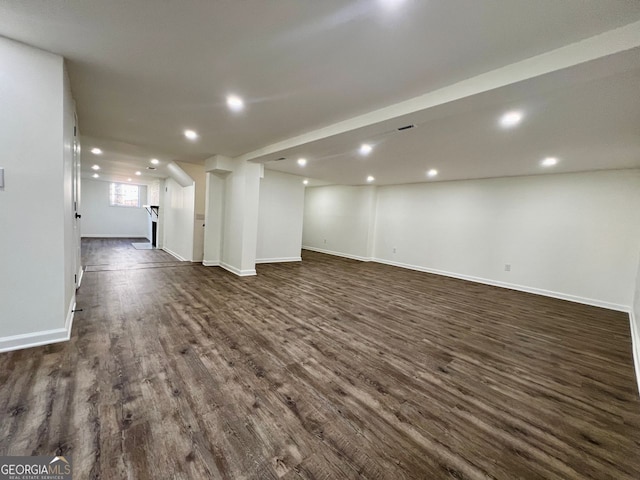 basement with dark wood-type flooring