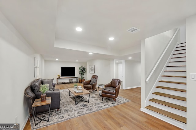 living room with hardwood / wood-style flooring