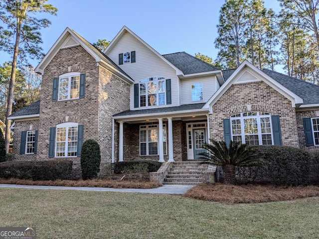 view of front of house with a front lawn