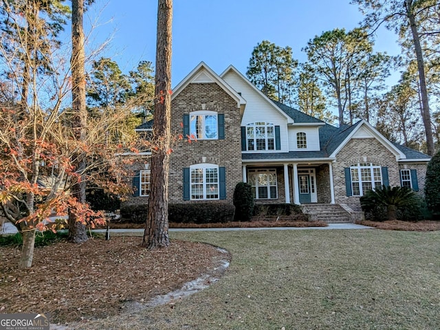 view of front of home featuring a front lawn