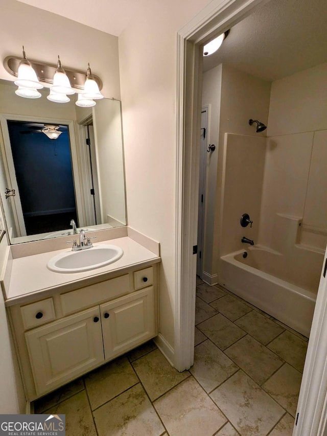 bathroom with vanity and tub / shower combination