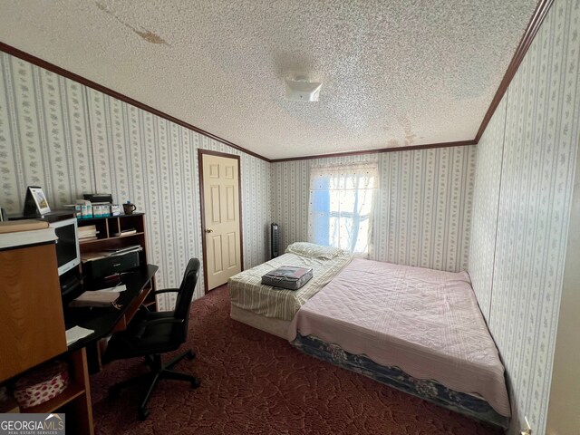 bedroom with carpet flooring, crown molding, and a textured ceiling