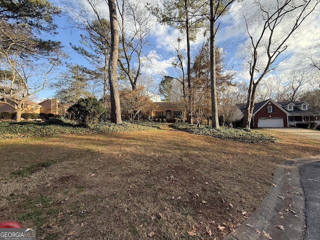 view of yard with a garage