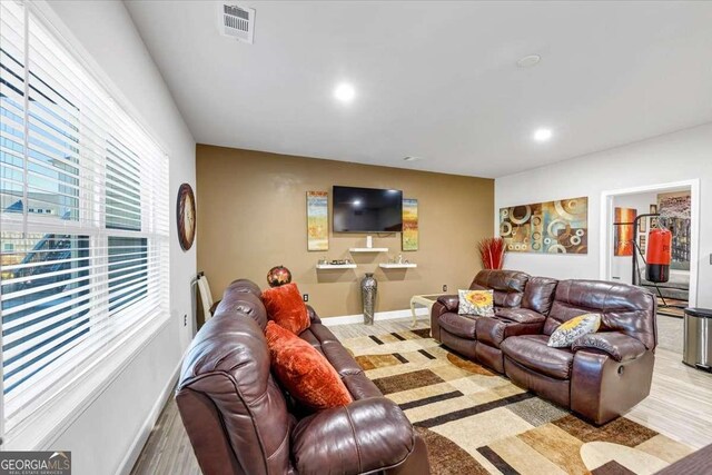 living room with light wood-type flooring