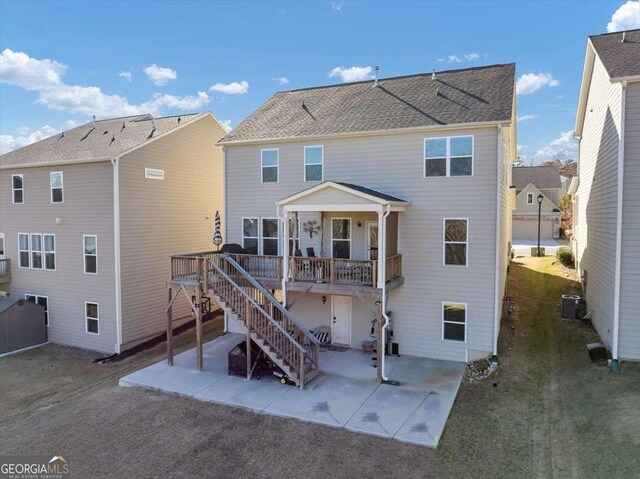 rear view of house featuring a patio