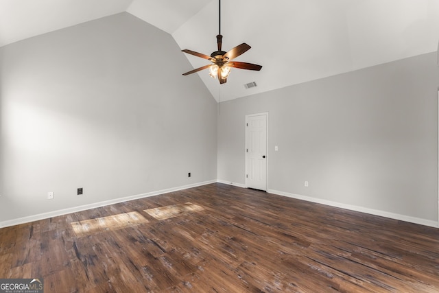 spare room featuring ceiling fan, dark hardwood / wood-style floors, and high vaulted ceiling