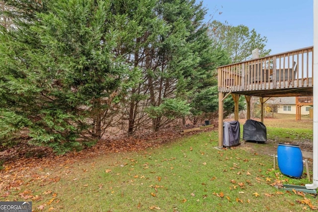 view of yard with a deck