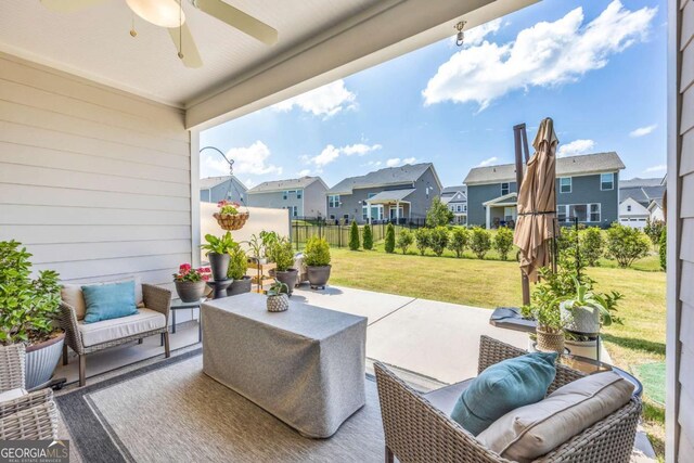 view of patio / terrace featuring ceiling fan