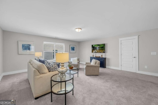 living room featuring light carpet