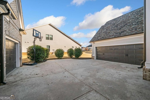 exterior space with a garage