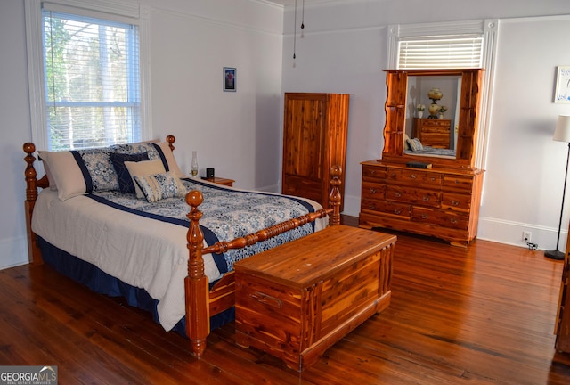 bedroom featuring dark wood-type flooring