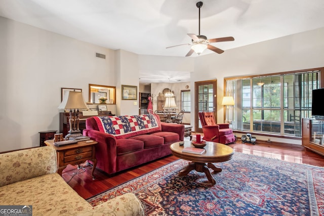 living room featuring hardwood / wood-style flooring and ceiling fan