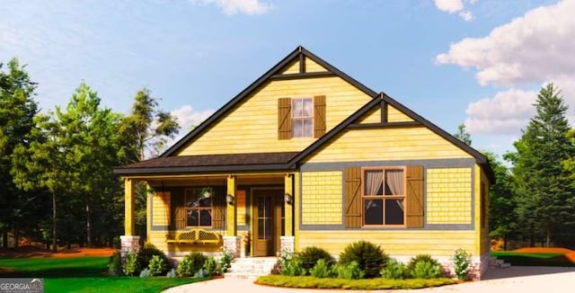 view of front of property featuring covered porch