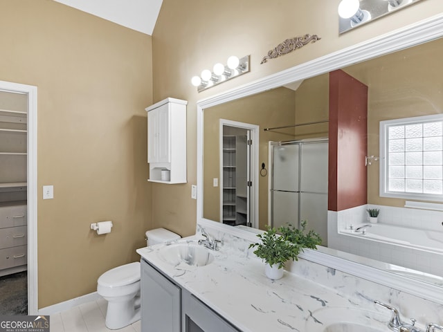 full bathroom featuring lofted ceiling, vanity, plus walk in shower, tile patterned floors, and toilet