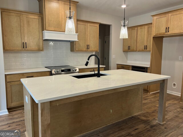 kitchen with a sink, stainless steel electric range, premium range hood, dark wood finished floors, and hanging light fixtures