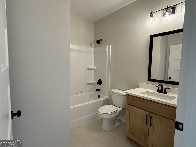 full bath featuring toilet, vanity, and shower / washtub combination
