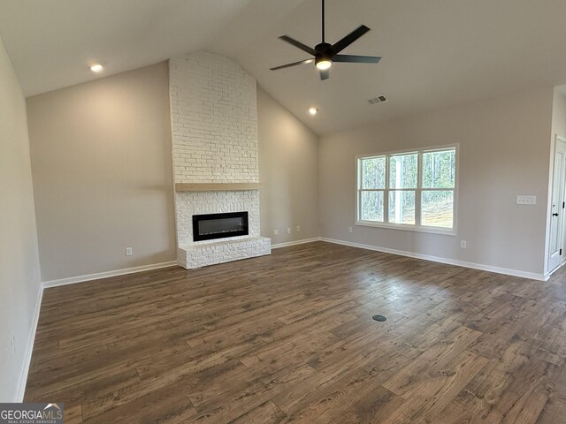 unfurnished living room with a ceiling fan, a fireplace, baseboards, visible vents, and dark wood-style flooring