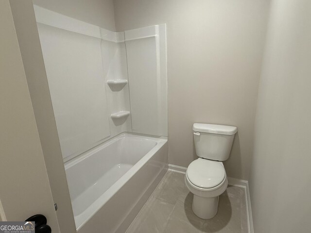 full bath with baseboards, toilet, and tile patterned floors