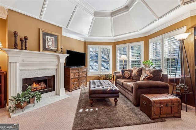 interior space featuring a high end fireplace and coffered ceiling