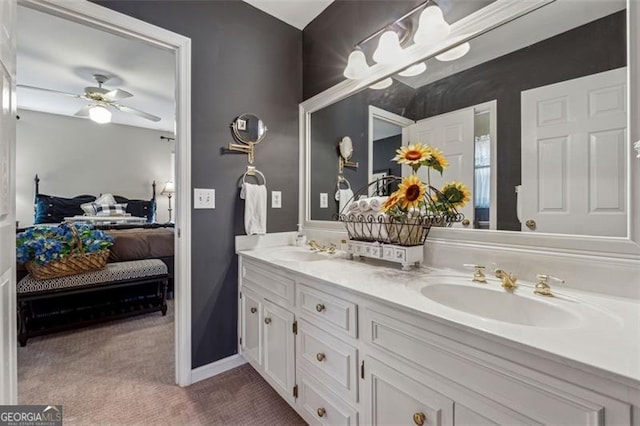 bathroom featuring vanity and ceiling fan