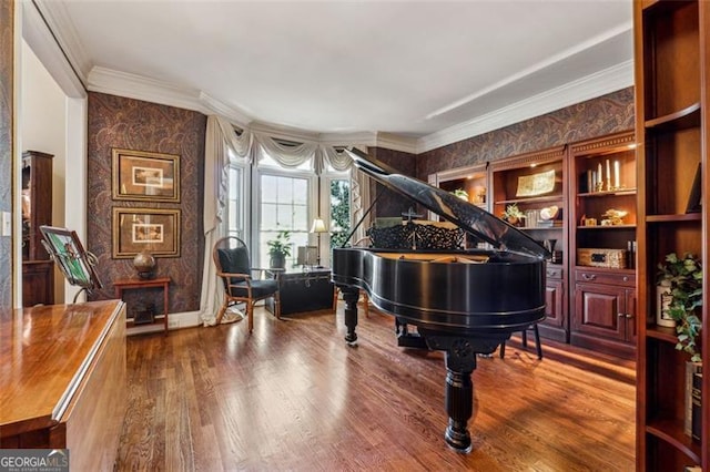 miscellaneous room featuring wood-type flooring and crown molding